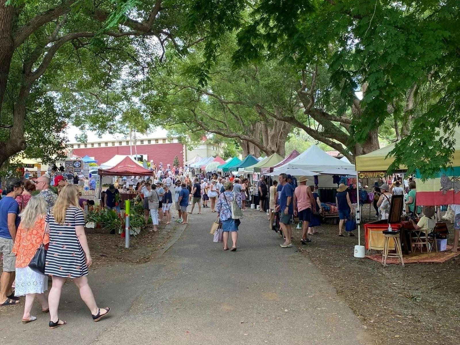 Stalls under the camphor laurels at the Bangalow Market on the Northern Rivers